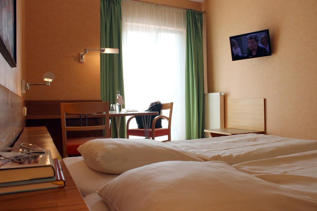 An der Persiluhr Stadt-gut-Hotel Lünen Zimmer foto
